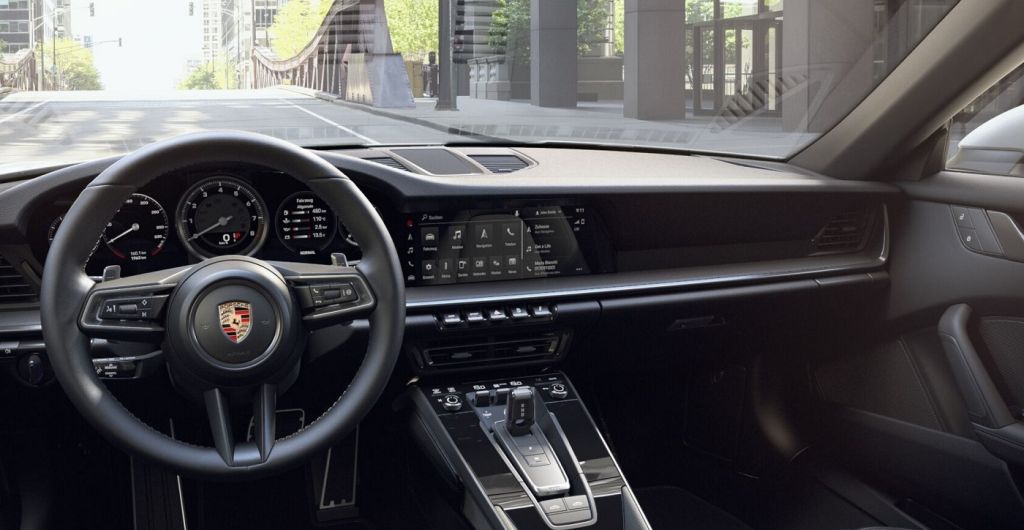 car window tinting service being done on a Porche.